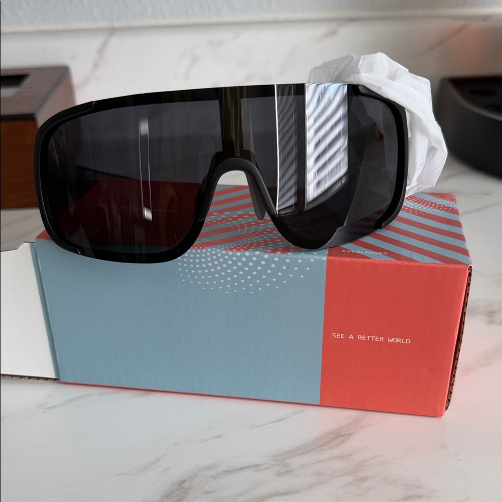 Polarized Sports Sunglasses Black/gray never worn. Still in box. UV Protection